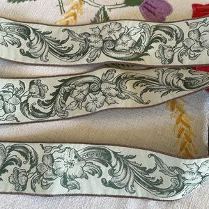 Very old tapestry/jacquard ribbon cream/ecru color w green floral motif, 1.5 yds